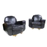 A PAIR OF ART DECO PERIOD CLUB ARMCHAIRS IN DISTRESSED LEATHER