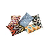 A COLLECTION OF FIVE IKAT DESIGN CUSHIONS, 20TH CENTURY,