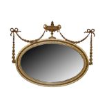 AN ADAM STYLE GILTWOOD AND GESSO OVAL MIRROR, 19TH CENTURY