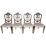 A SET OF FOUR GEORGE III MAHOGANY HEPPLEWHITE DESIGN DINING CHAIRS