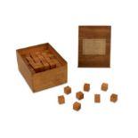 WITHDRAWN - A BOXED SET OF WOODEN GEOMETRIC CUBES, EARLY 20TH CENTURY