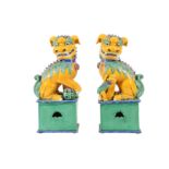 A PAIR OF CHINESE PORCELAIN LIONS AND CUBS, 20TH CENTURY,