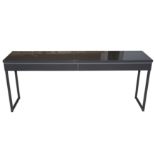 A CONTEMPORARY CONSOLE TABLE IN A GLOSSY GREY FINISH