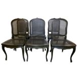 A SET OF SIX FRENCH LOUIS XV STYLE BLACKENED OAK AND CANED DINING CHAIRS, LATE 20TH CENTURY