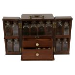 A GEORGE III MAHOGANY TRAVELLING MEDICINE OR APOTHECARY CABINET