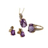 AN AMETHYST PENDANT NECKLACE, RING AND EARRING SUITE