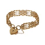 A GOLD GATE-LINK BRACELET,