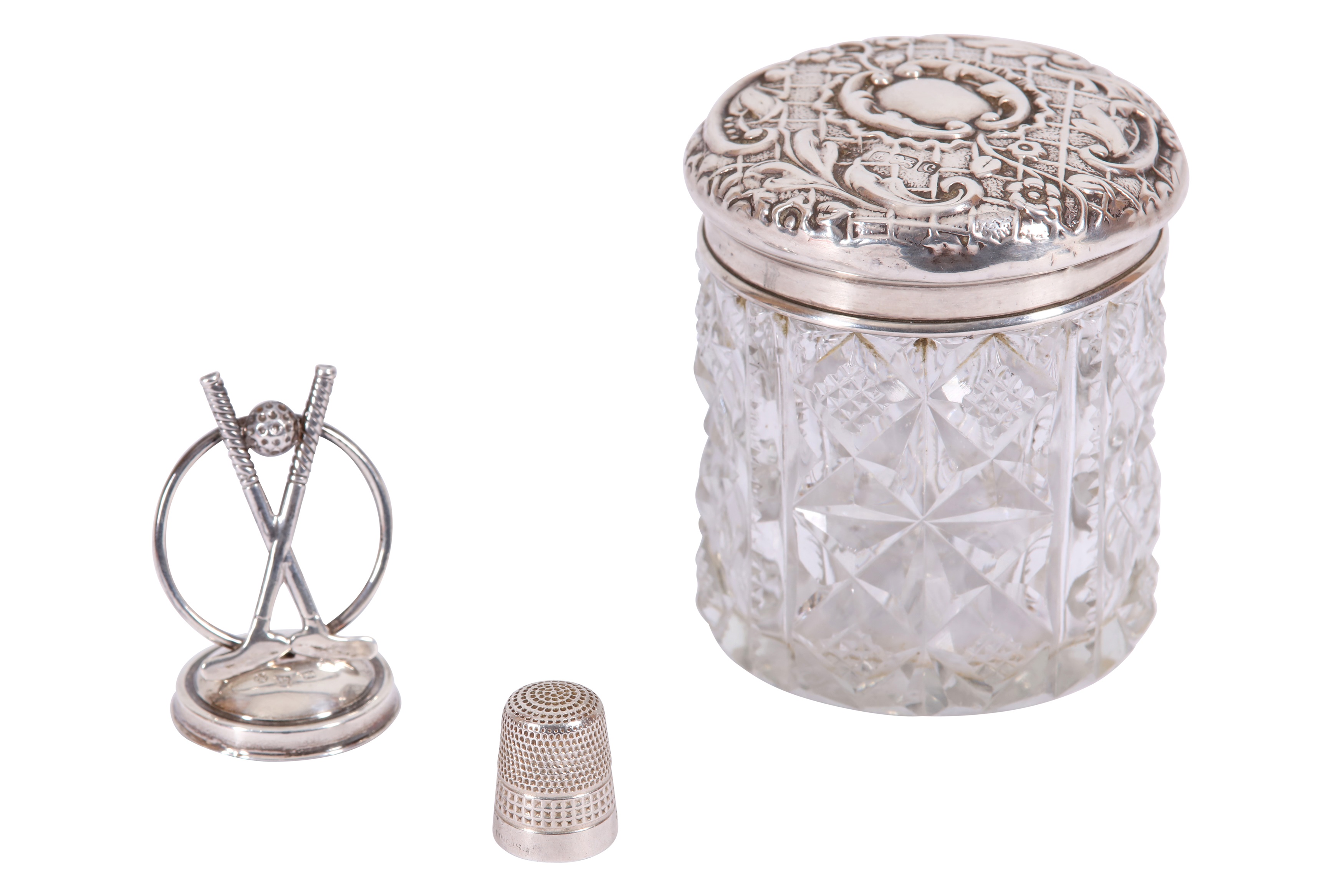 AN EDWARDIAN DRESSING TABLE JAR WITH A STERLING SILVER LID