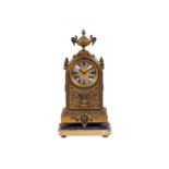 A LATE 19TH CENTURY FRENCH GILT AND SILVERED METAL MANTEL CLOCK