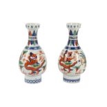 A PAIR OF CHINESE FAMILLE VERTE PORCELAIN DRAGON VASES