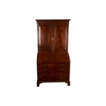 A GEORGE III MAHOGANY BUREAU BOOKCASE