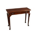 A GEORGE II CUBAN MAHOGANY TEA TABLE