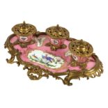 A MID 19TH CENTURY FRENCH GILT BRONZE AND SEVRES STYLE PORCELAIN MOUNTED INKSTAND
