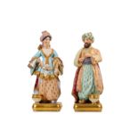 A PAIR OF MID 19TH CENTURY 'PORCELAIN DE PARIS' FIGURAL PERFUME BOTTLES OF A SULTAN AND SULTANA