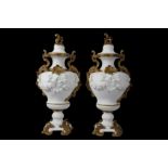A PAIR OF VERY LARGE 19TH CENTURY SÈVRES STYLE BISCUIT PORCELAIN VASE AND COVERS