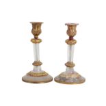 A PAIR OF 19TH CENTURY FRENCH ROCK CRYSTAL AND ORMOLU MOUNTED CANDLESTICKS