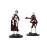 MANNER OF SIMON TROGER: A PAIR OF 18TH CENTURY FRUITWOOD AND IVORY FIGURES