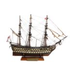 A FIRST HALF 20TH CENTURY PAINTED WOOD MODEL OF HMS VICTORY