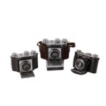 A Group of Certo Dollina Folding Rangefinder Cameras