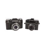 A Pair of Black SLR Cameras