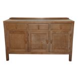 A HEAL'S LIMED OAK SIDEBOARD