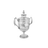 A George III sterling silver twin handled cup and cover, London 1810 by William Frisbee (first reg.