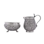 An early 20th century Anglo – Indian unmarked silver sugar bowl and milk jug, Lucknow circa 1920