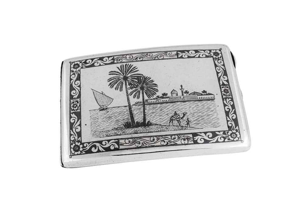 An early 20th century Iraqi silver and niello cigarette case, Basra dated 1938 - Image 2 of 5