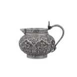 An early 20th century Anglo - Indian unmarked silver cream jug, Lucknow circa 1910