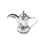 An early 20th century Iraqi silver and niello Dallah coffee pot, Basra circa 1930, signed Omara, Ame