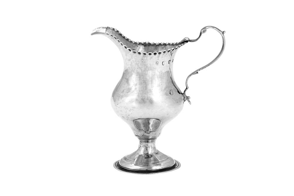 A George III sterling silver cream jug, London 1781 by Hester Bateman - Image 2 of 3