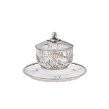 An early 20th century French 950 standard silver gilt mounted glass caviar dish and stand, Paris cir