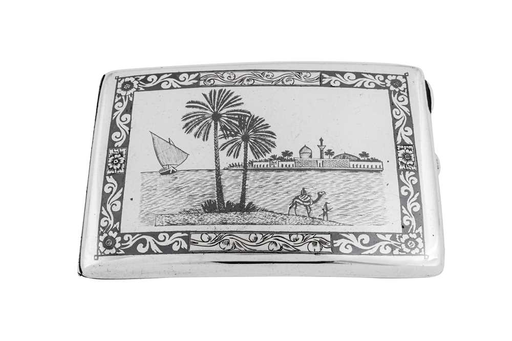 An early 20th century Iraqi silver and niello cigarette case, Basra dated 1938