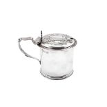 A Victorian sterling silver mustard pot, London 1865 by William Evans