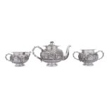 An early 20th century Anglo – Indian unmarked silver three-piece tea service, Calcutta circa 1910