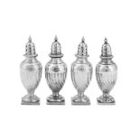 A set of four Victorian sterling silver pepper pots, Birmingham 1893 by Vale Brothers & Sermon