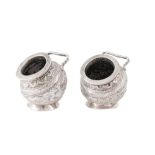 A PAIR OF EARLY 20TH CENTURY ANGLO - INDIAN UNMAKRED SILVER SALTS, CUTCH CIRCA 1910