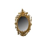 A ROCOCO REVIVAL OVAL GIRANDOLE MIRROR, 19TH CENTURY