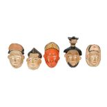 A COLLECTION OF DECORATVE SOUTH EAST ASIAN HARDWOOD MASKS, 20TH CENTURY