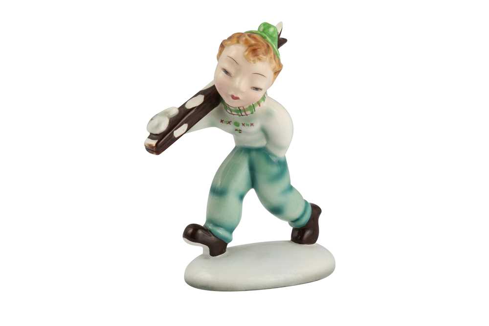 A GOLDSCHEIDER POTTERY FIGURE OF A BOY