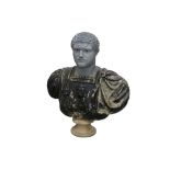 A LARGE RECONSTITUTED STONE CLASSICAL BUST OF A ROMAN EMPEROR, BELIEVED TO BE NERO, 20TH CENTURY