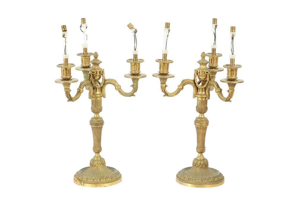 A PAIR OF LOUIS XVI STYLE BRONZE CANDLESTICKS, EARLY 20TH CENTURY