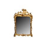 A PAIR OF ROCOCO REVIVAL CARVED GILTWOOD MIRRORS, 19TH CENTURY
