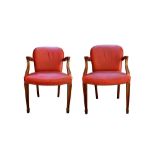 A PAIR OF VICTORIAN RED LEATHER AND MAHOGANY LIBRARY CHAIRS