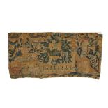 A 17TH CENTURY FLEMISH VERDURE TAPESTRY FRAGMENT FEATURING RABBITS