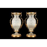 A PAIR OF BELLE EPOQUE STYLE BACCARAT GILT BRONZE MOUNTED GLASS VASES