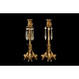 A PAIR OF LATE 19TH CENTURY FRENCH GILT BRONZE AND CUT GLASS CANDLESTICKS
