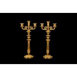 A FINE PAIR OF EARLY 19TH CENTURY FRENCH EMPIRE PERIOD GILT BRONZE CANDELABRA CIRCA 1820