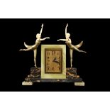 FERDINAND PREISS (1882-1943): A RARE CLOCK MOUNTED WITH DANCING GIRLS 'BUTTERFLY DANCERS'