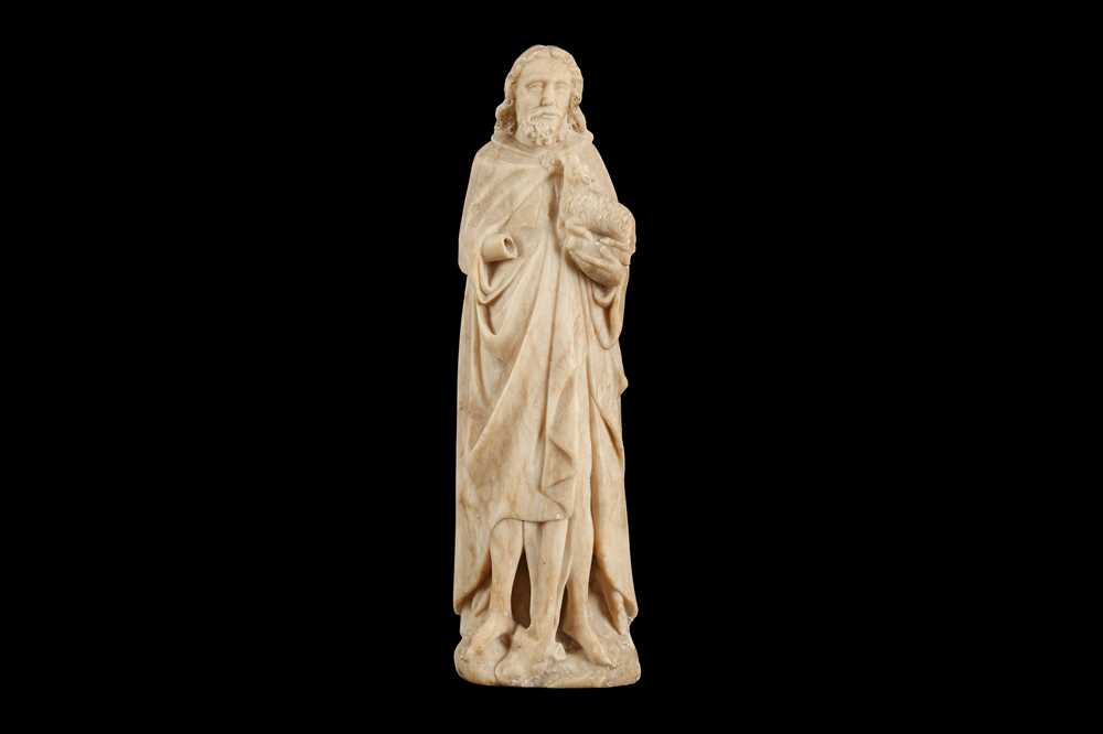 AN ALABASTER FIGURE OF ST JOHN THE BAPTIST, POSSIBLY ENGLISH (NOTTINGHAM) 15TH CENTURY